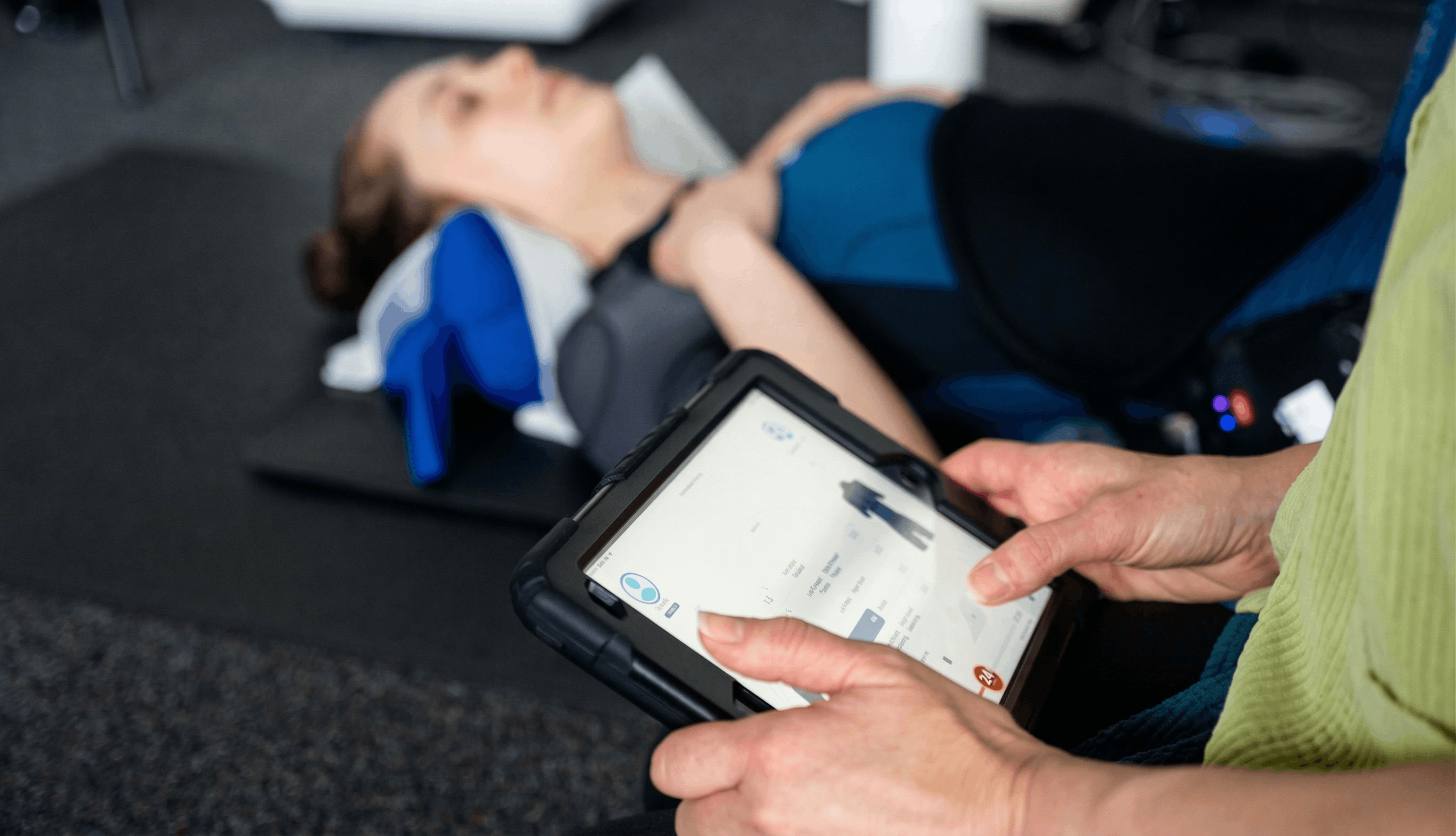 Clinician reviewing patient data during testing